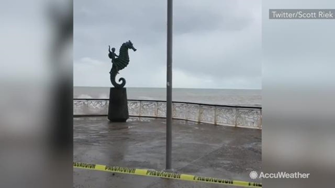 High waves crash onto famous boardwalk from Hurricane 