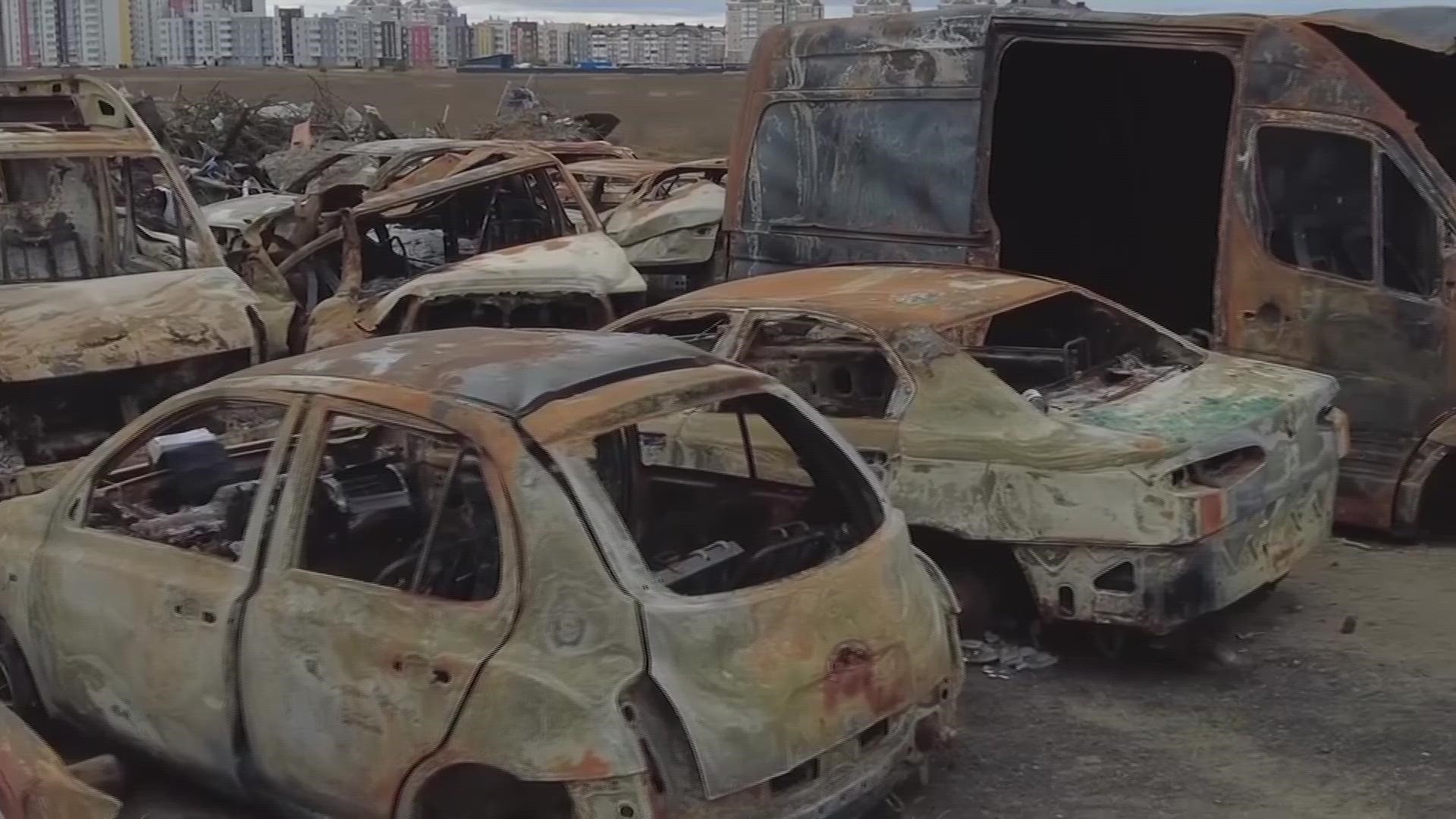 Vehicles destroyed in Ukraine war brought to car graveyard in Bucha