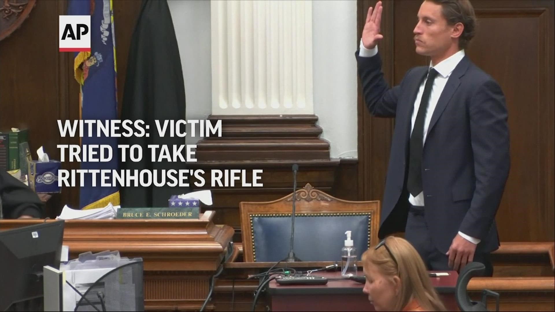 The first man shot by Kyle Rittenhouse on the streets of Kenosha lunged toward Rittenhouse's rifle in an attempt to take it away, a witness testified.