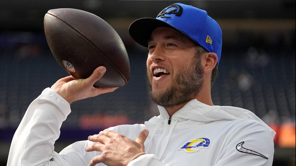 Los Angeles Rams quarterback Matthew Stafford (9) hugs head coach Sean McVay  after the NFL Supe …