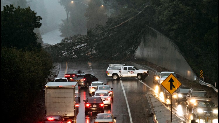 2 dead in submerged car as California storm worries spread