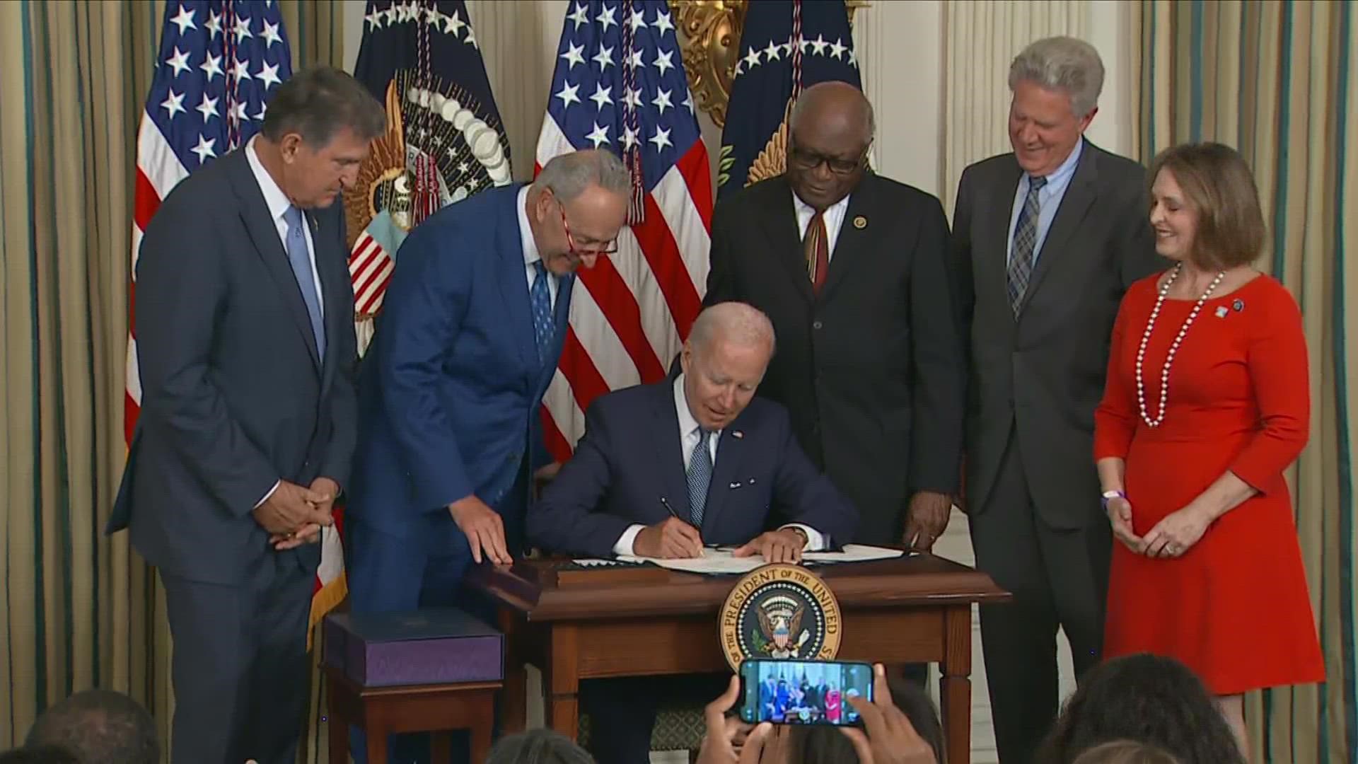 President Biden signed the Inflation Reduction Act on Tuesday, which includes the biggest federal investment ever to fight climate change and lowers healthcare cost.