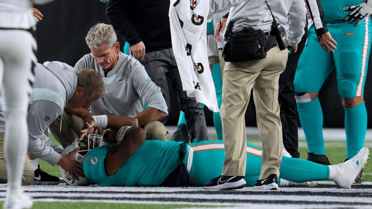 Dolphins' Tagovailoa taken to hospital after head injury, questions raised  about concussion protocol