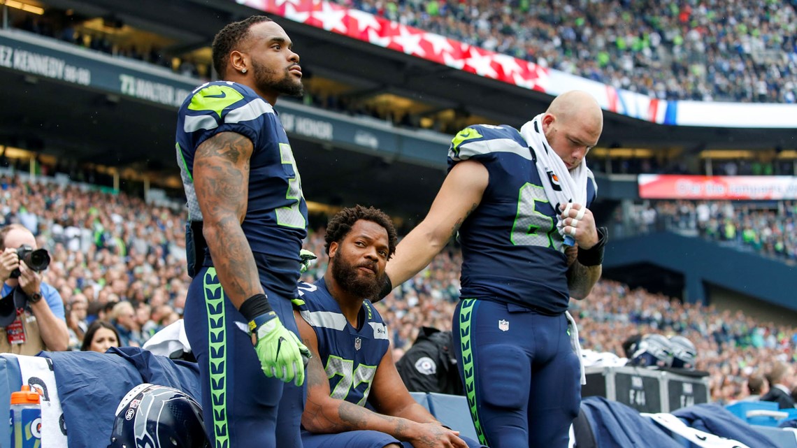 Seahawks' Michael Bennett explains why he stood up during the national  anthem - Los Angeles Times