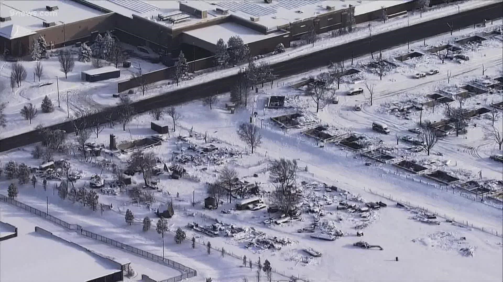 Two people are missing after a wildfire destroyed 991 structures, according to the Boulder County Sheriff's Office.