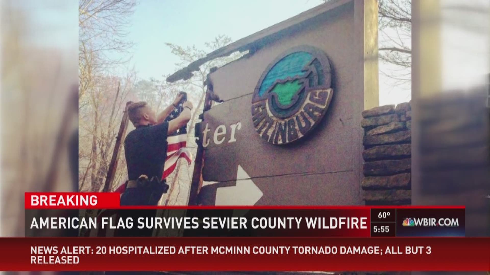 A police officer found a flag under the debris of the wildfire and hung it on the Gatlinburg sign as a symbol of hope