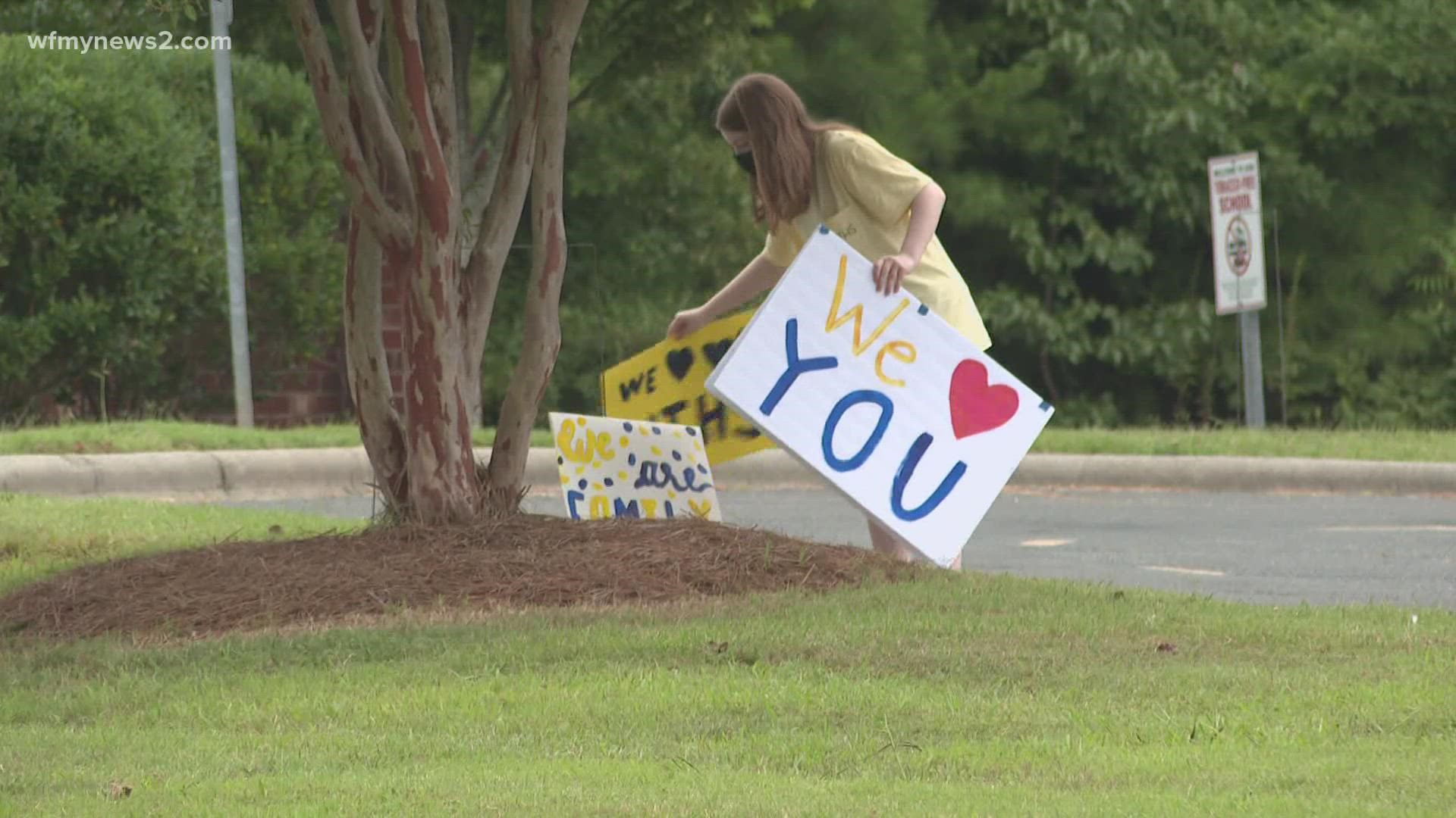 They wrote encouraging messages to students as they come back to school days after a deadly shooting on campus.