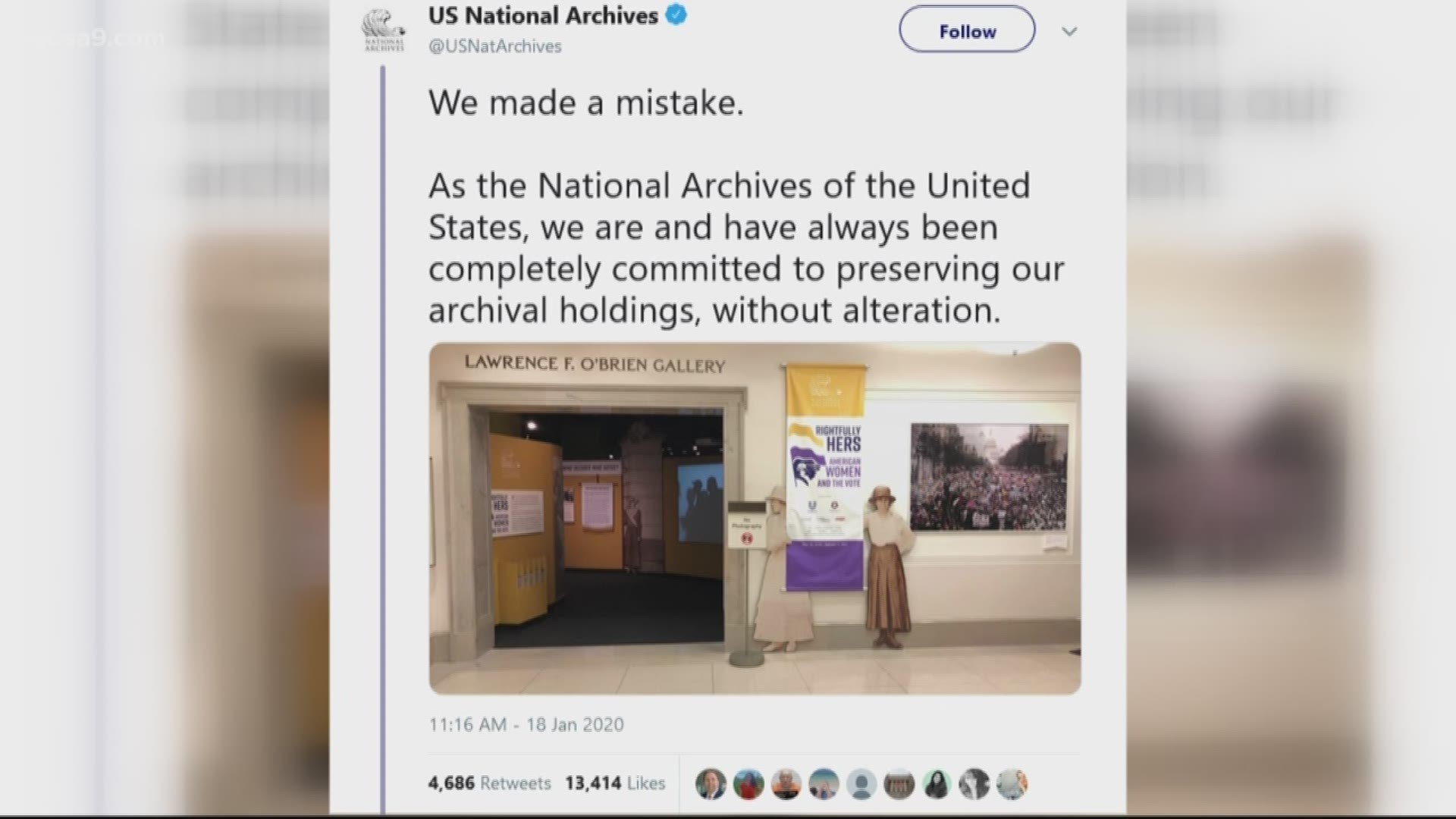 Officials with the Archives have since removed the photo, which purposefully blurred signs held by protesters that were critical of President Donald Trump.