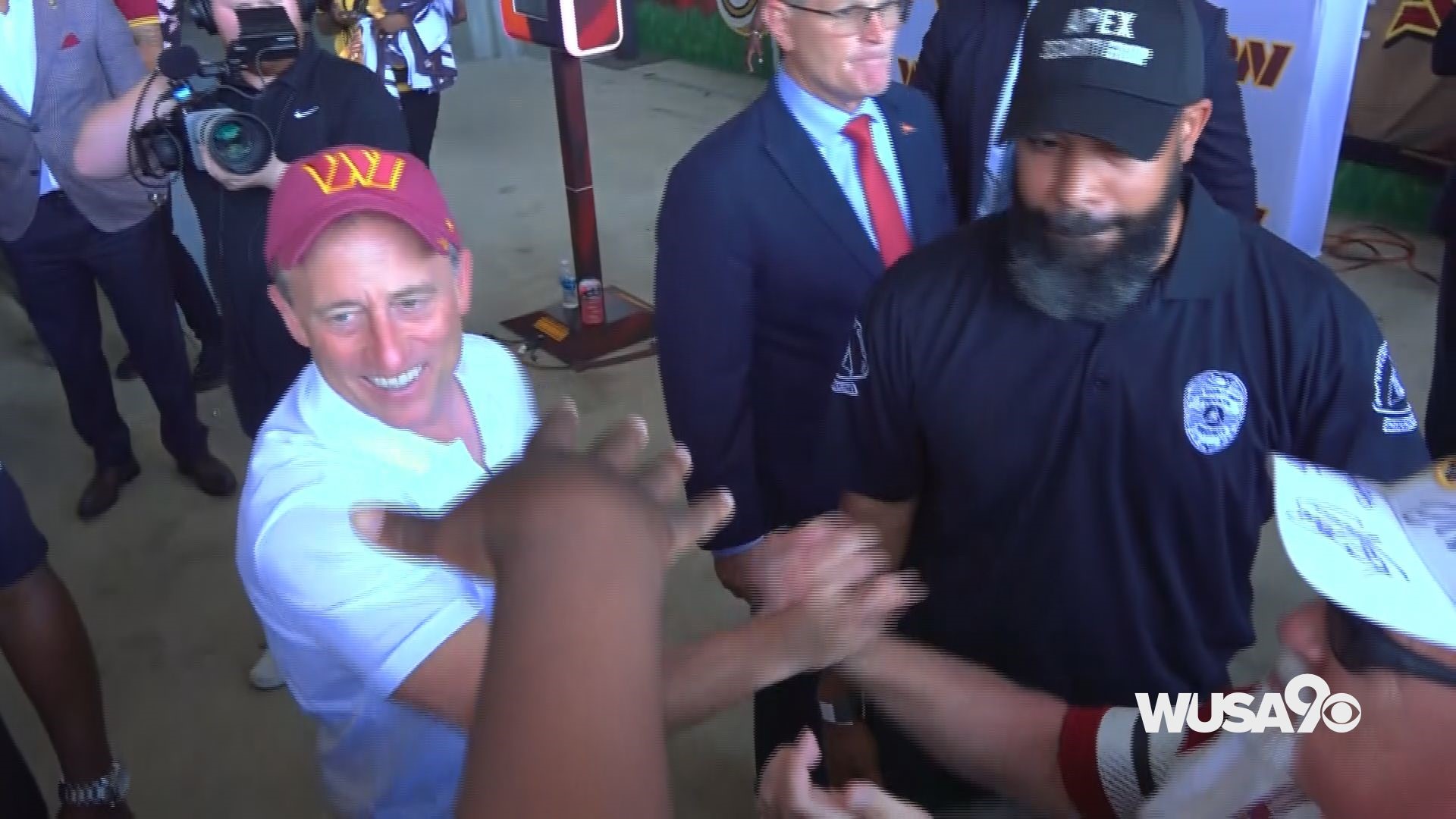 New Commanders owner Josh Harris greets fans at FedEx Field