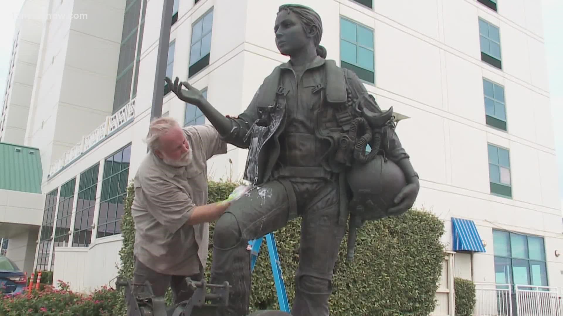 The Naval Aviation Monument's bronze statues are beginning to suffer from corrosion. Work has begun to preserve them.