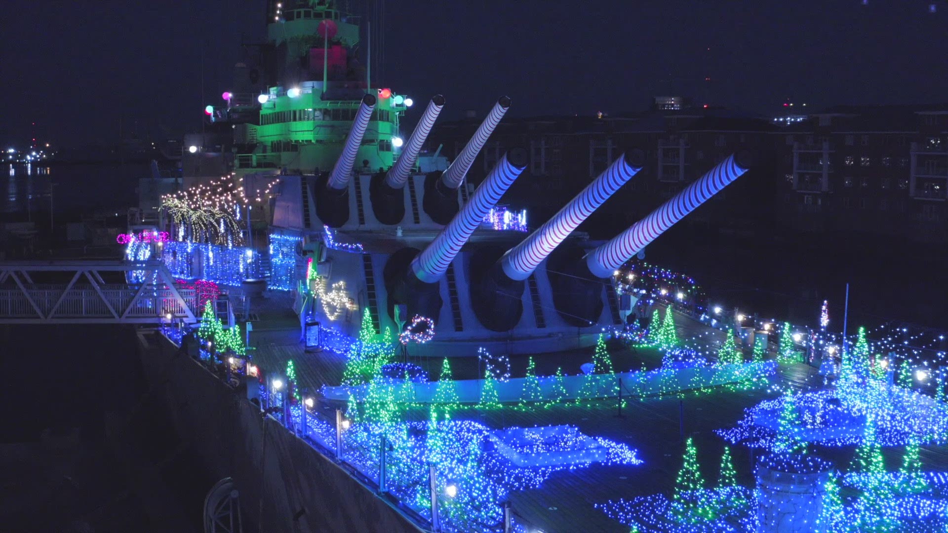 Drone footage of "WinterFest on the Wisconsin" which features more than 250,000 lights as part of the holiday display on the Battleship Wisconsin in Norfolk, Va.