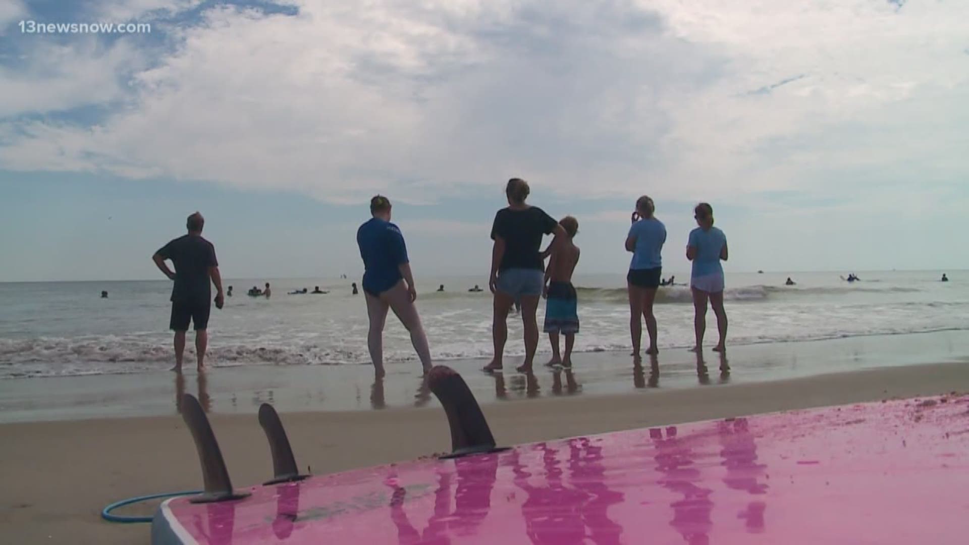 Students at Green Run High School and Frank W. Cox High School came together to learn and teach surfing. It's a way to bring students together from different parts of the city for a positive purpose.