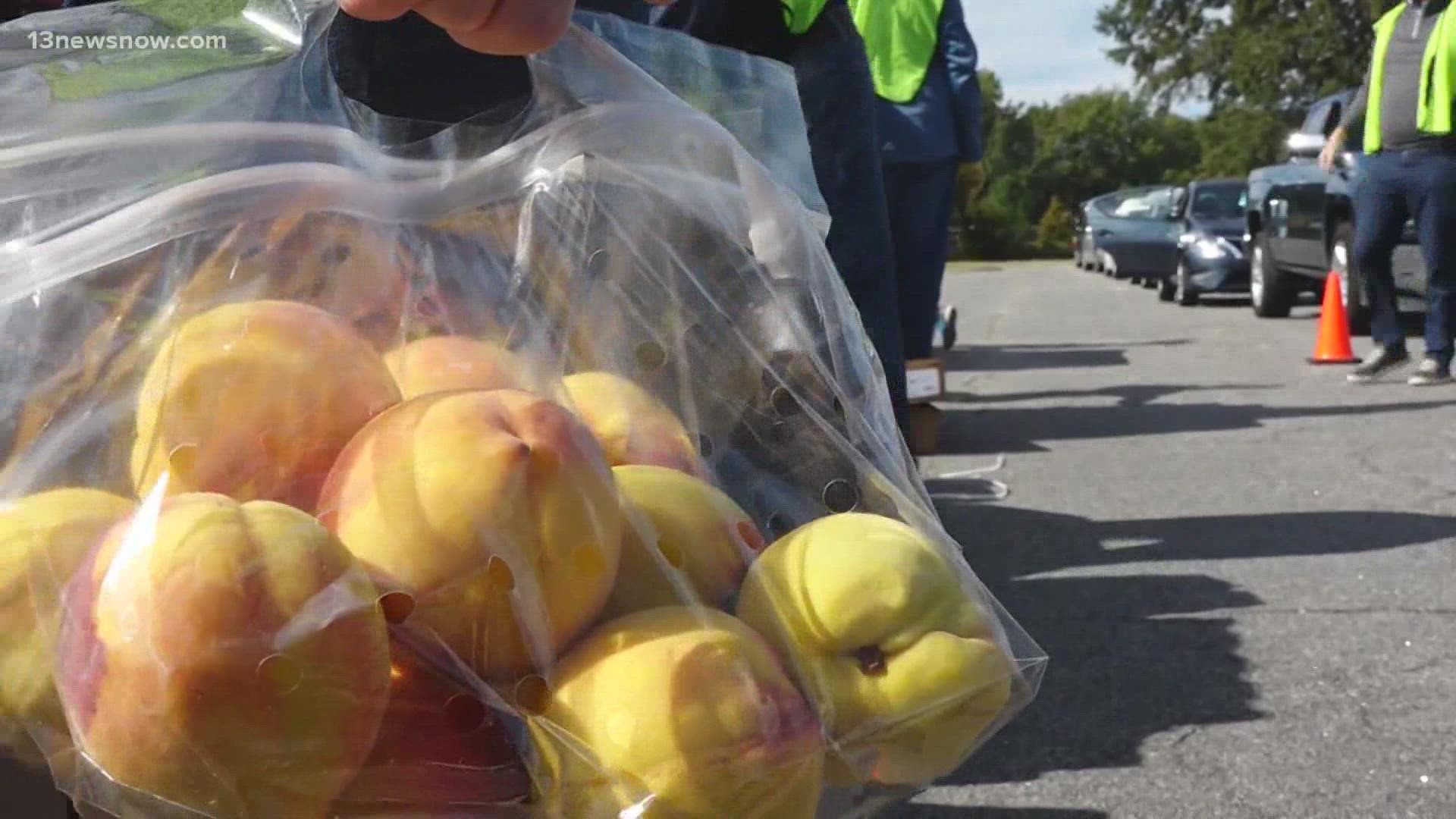 Leaders from NASA Langley helped hand out food at a distribution event hosted by the Virginia Peninsula Foodbank.