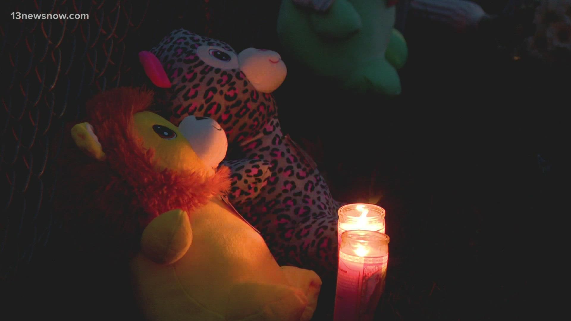 Family and friends held another vigil in Young Terrace honoring the women who were shot on Wednesday. One woman is sharing her story of surviving domestic violence.
