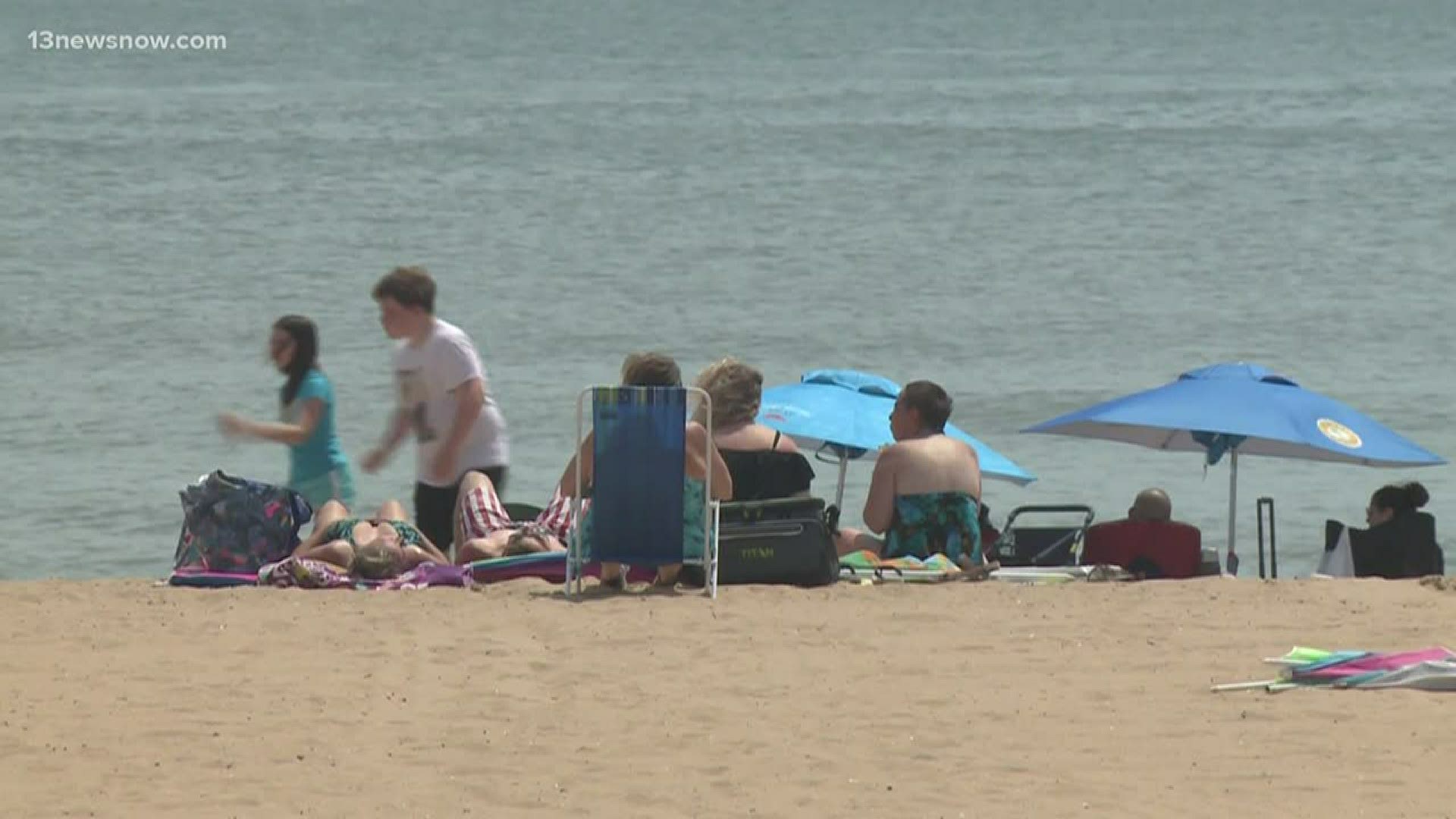 Beachgoers continued to social distance amid the coronavirus pandemic and new COVID-19 regulations are still in place at the beach.
