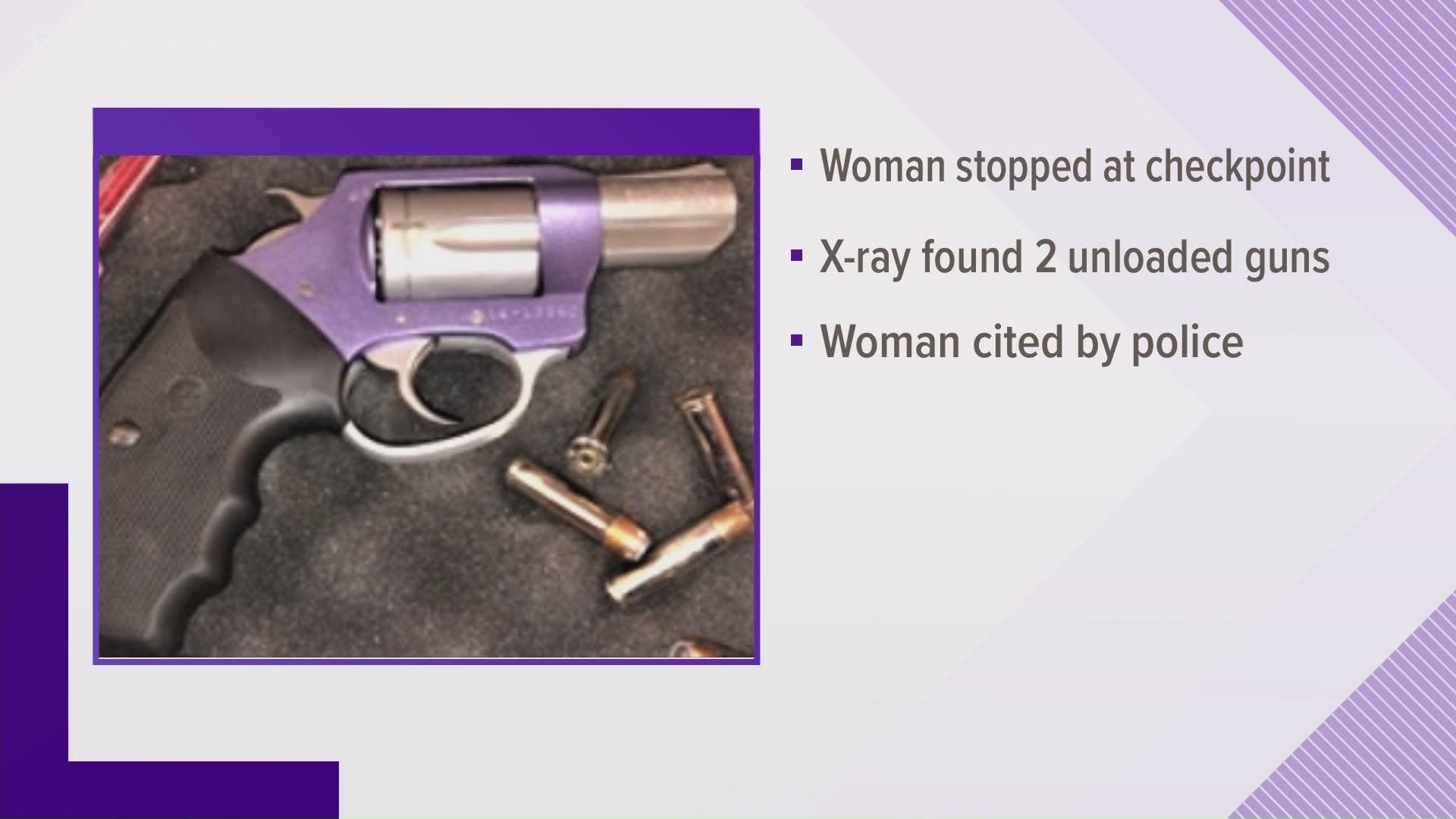 The woman was carrying a .40 caliber semi-automatic handgun and .38 caliber revolver. Neither weapon was loaded.
