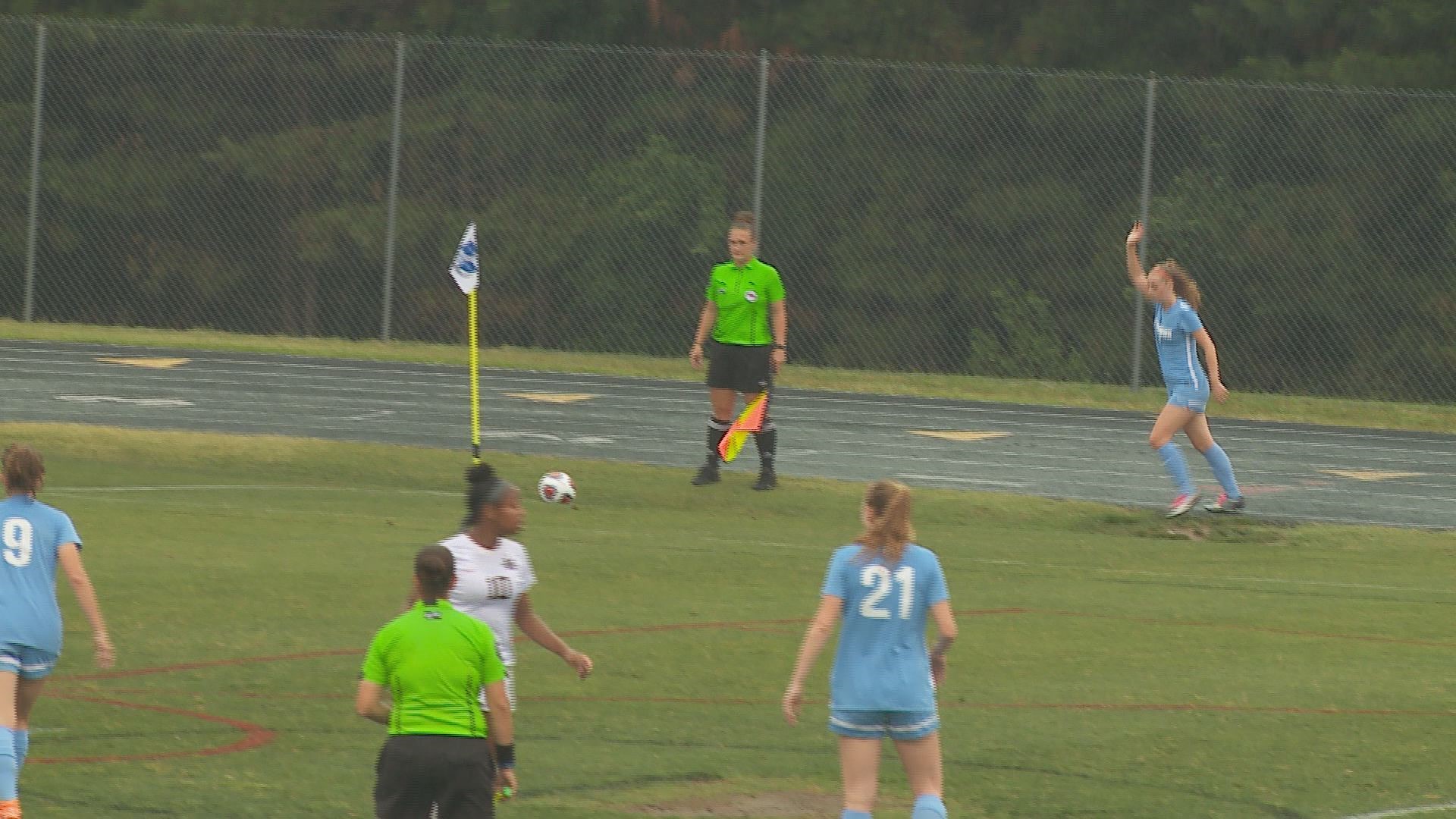 Soccer played through the rain in the state semifinals. Baseball and softball postponed.