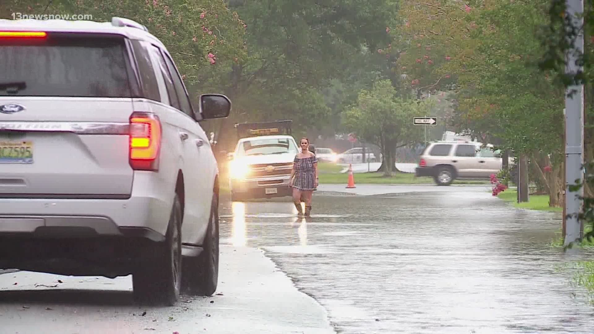 Virginia Beach homeowners concerned speeding drivers will push water into their homes.