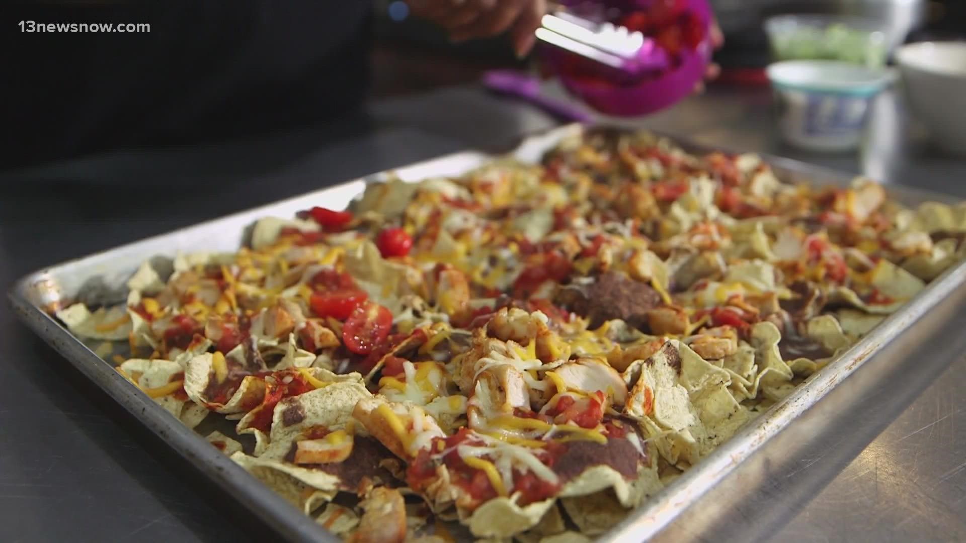 These nachos are delicious and healthier for you - with baked chips, chicken, and some lettuce and salsa!