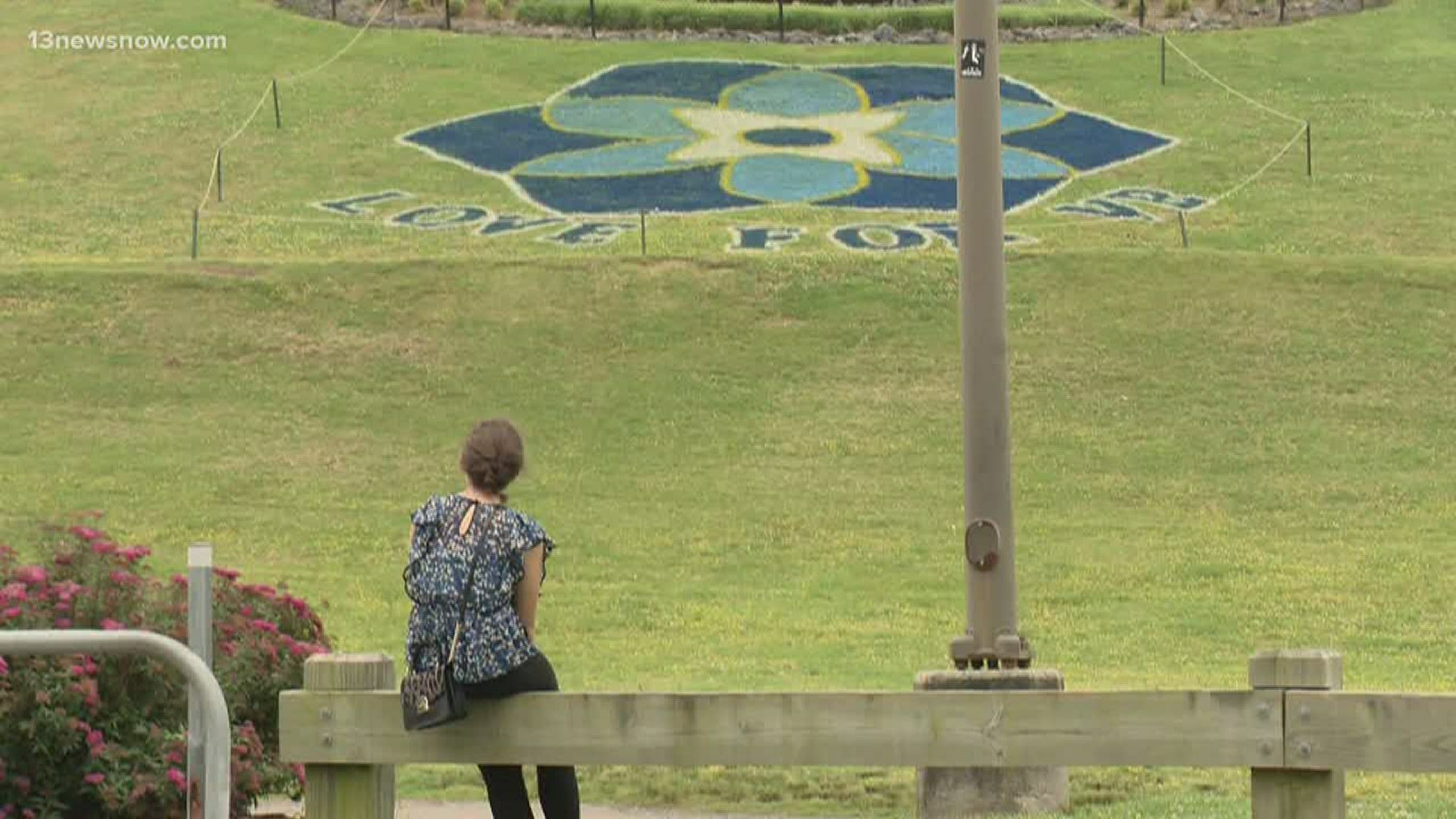 While exercising, many people stopped and took pictures of the Forget-me-not memorial at Mt. Trashmore Park. They said they want to honor and remember the victims.