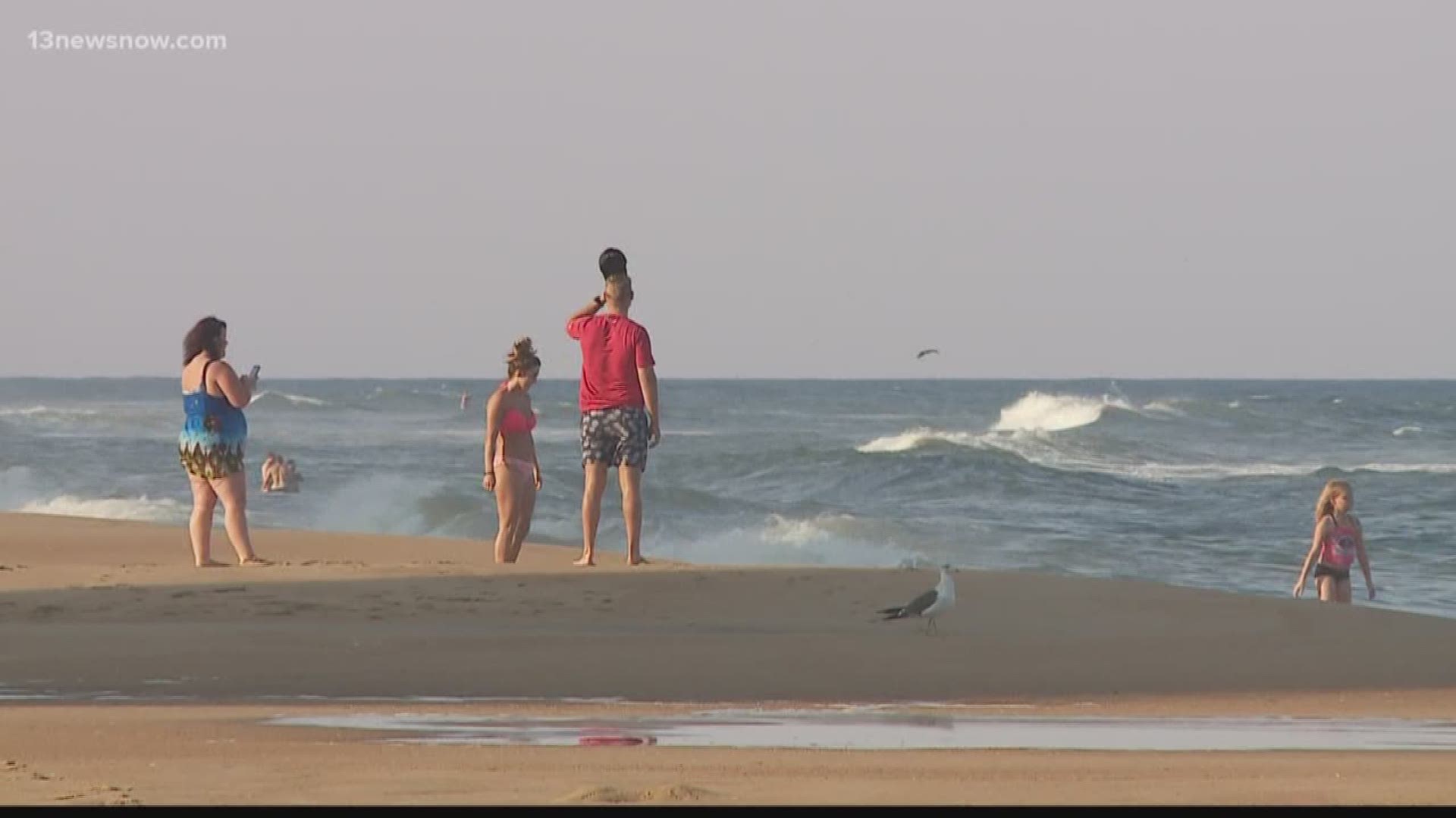 Virginia Beach firefighter rescues two swimmers in distress at the ...