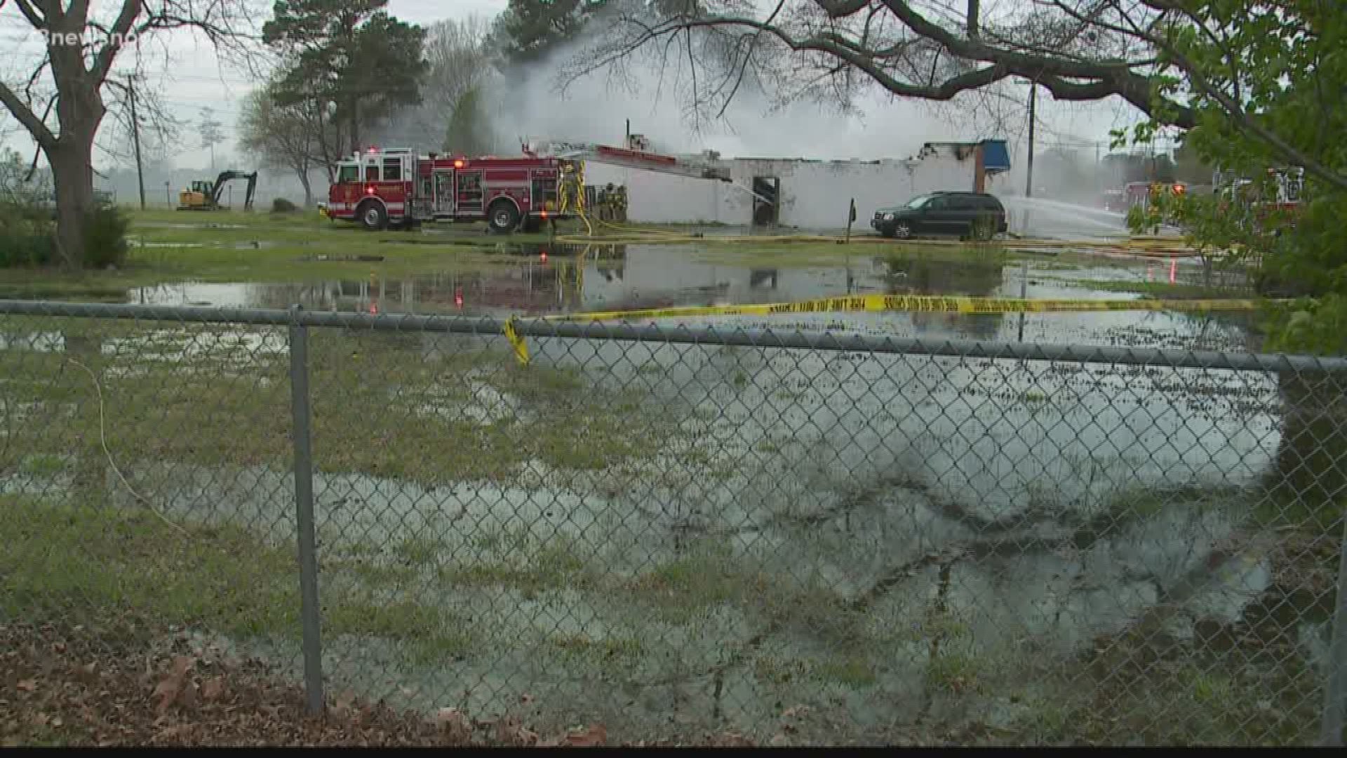 Heavy smoke and flames ripped through a store, causing the roof to collapse!