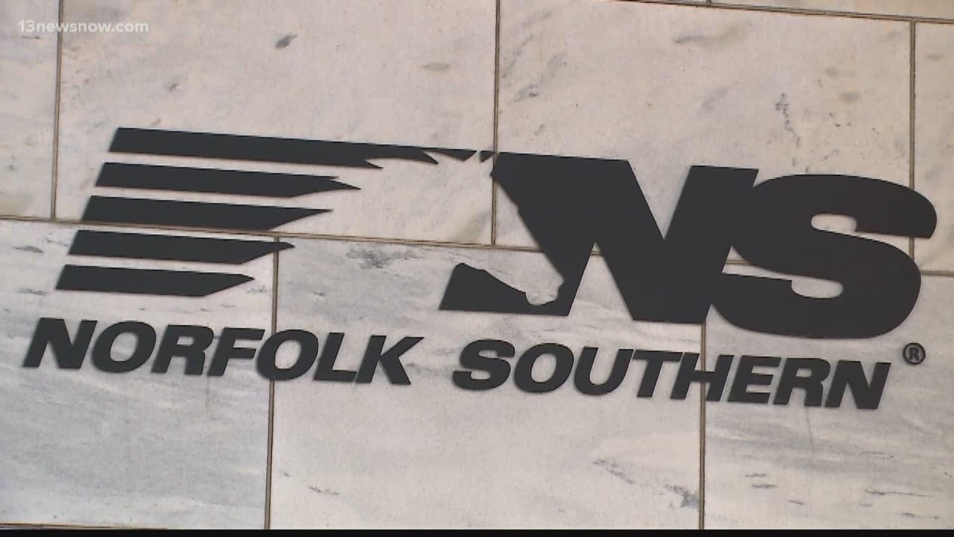A 16th-floor window on Norfolk Southern's skyscraper broke and the glass fell to the sidewalk below. There was no damage to the interior of the building.