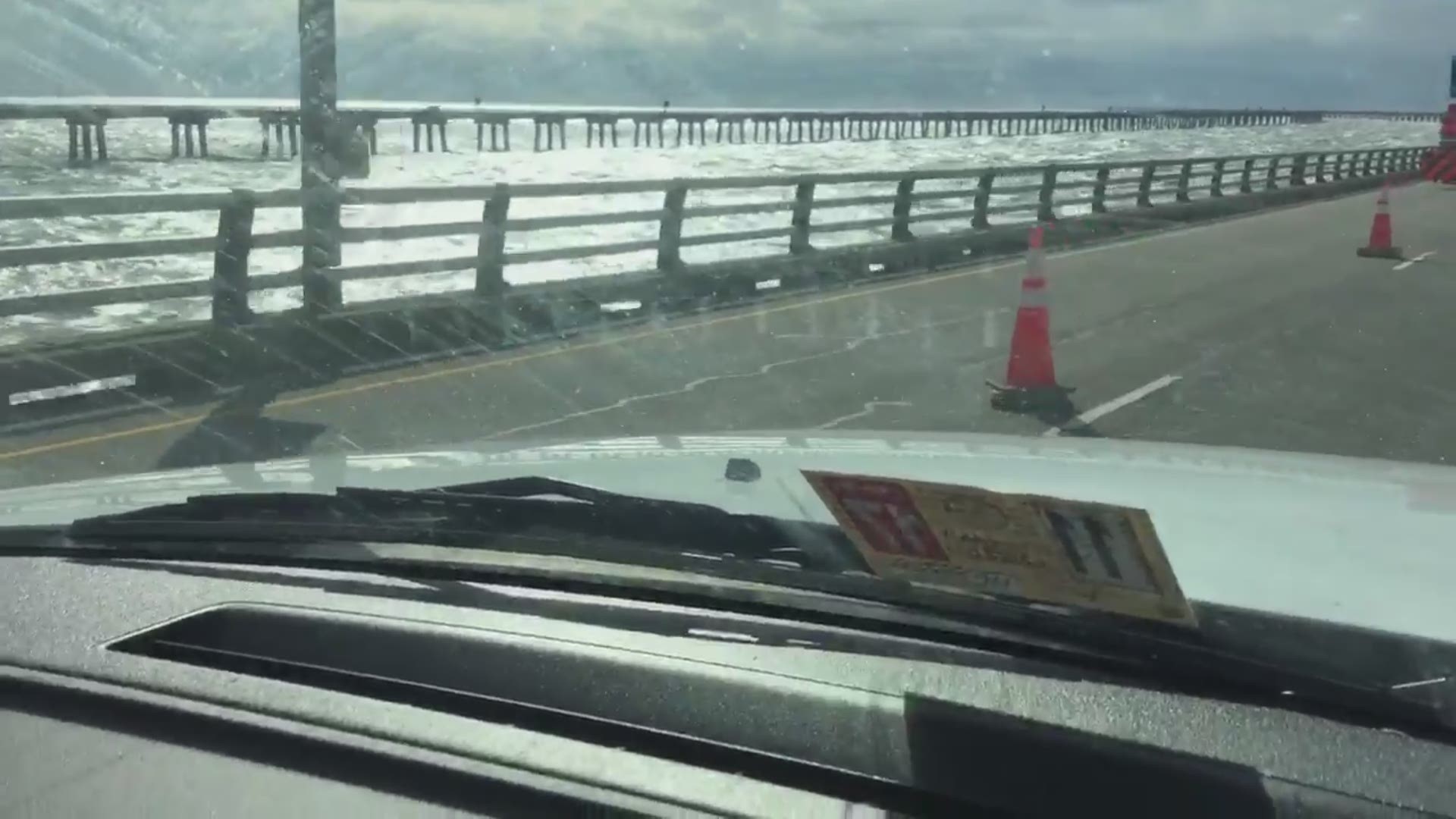 Railing partially torn off of Southbound lane on CBBT. There also appears to be debris in the road.  Video shot by Steven Graves