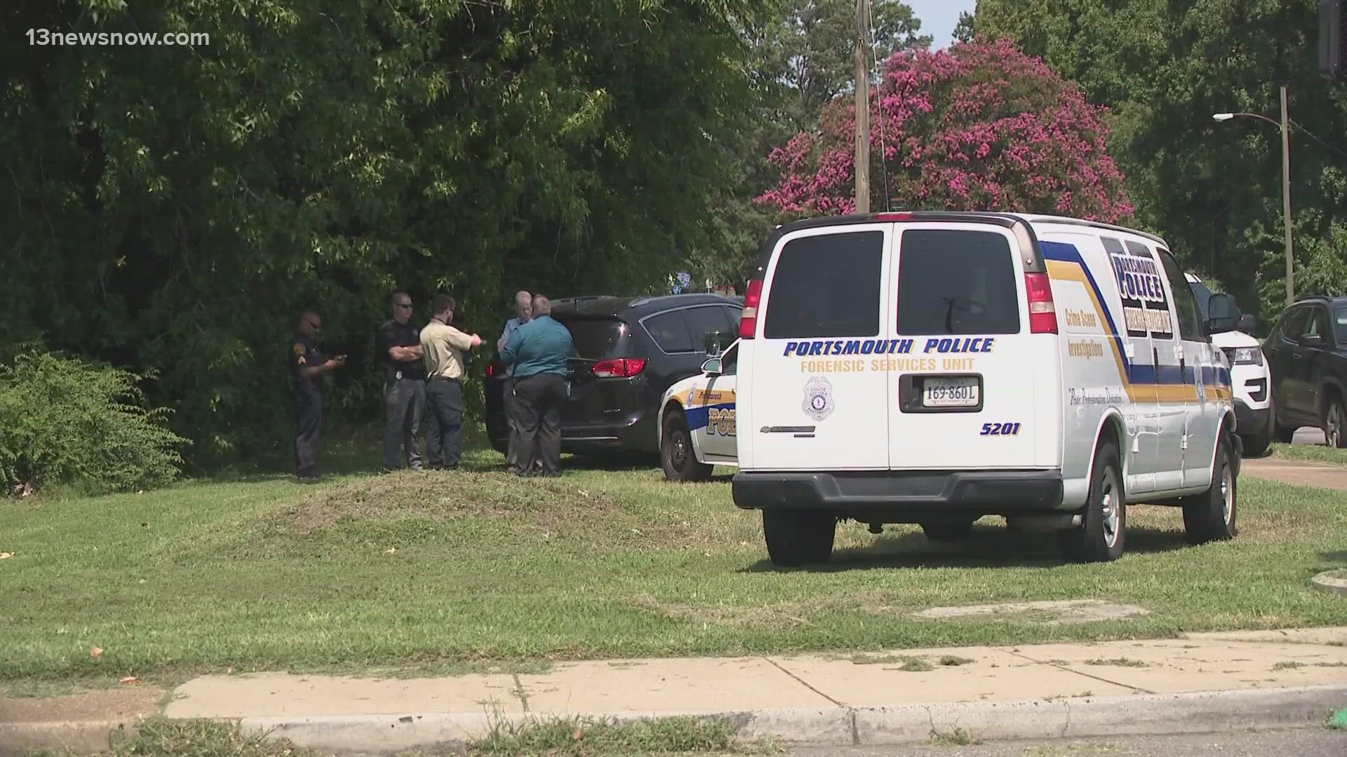 Police were investigating at the scene where a body was found along Frederick Boulevard Friday morning.