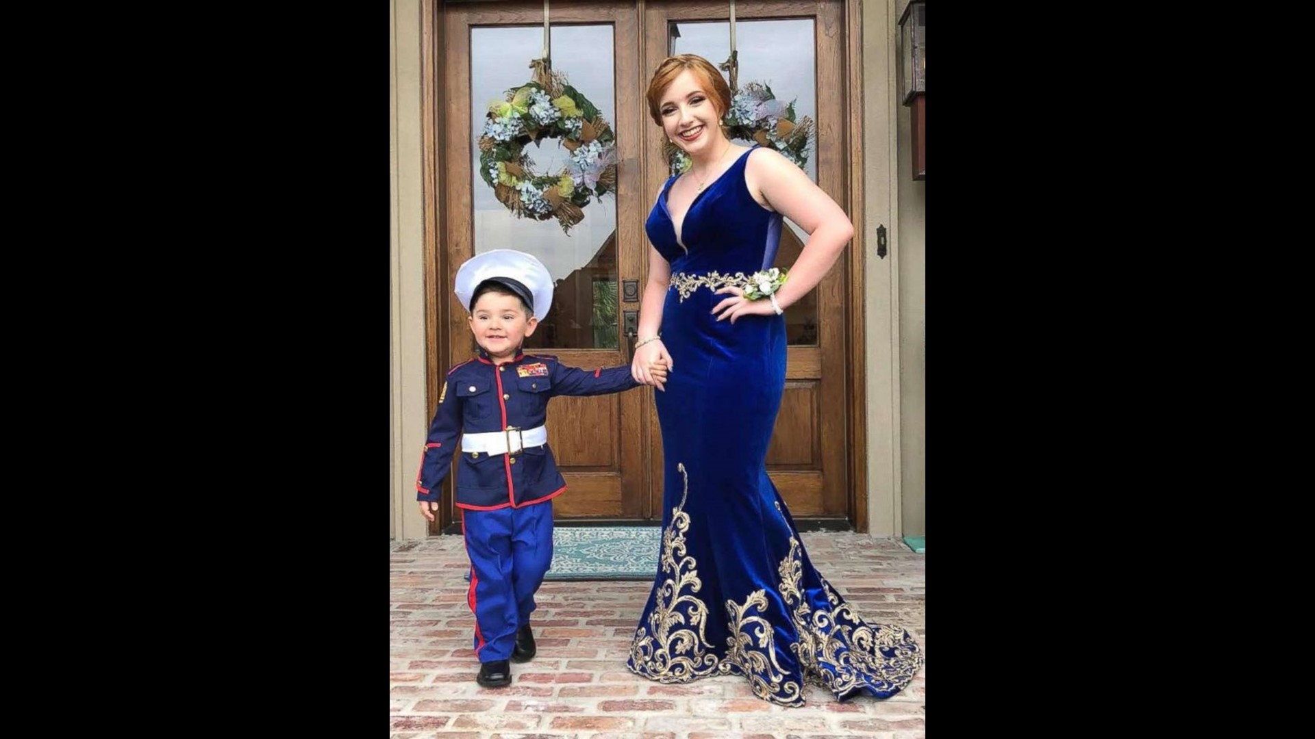 Adorable 2yearold stands in for his Marine brother in viral prom
