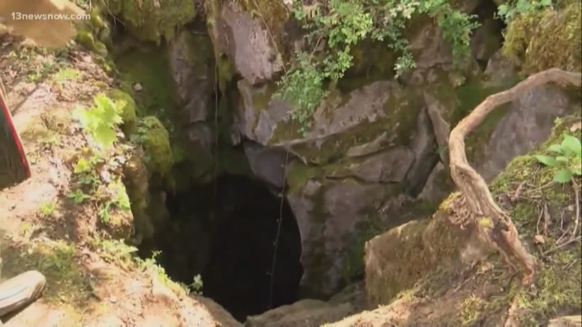 Officials say six men entered Cyclops Cave near Cleveland and had planned to camp overnight Saturday until conditions worsened because of drenching rains. The rains also made it difficult for them to get out.