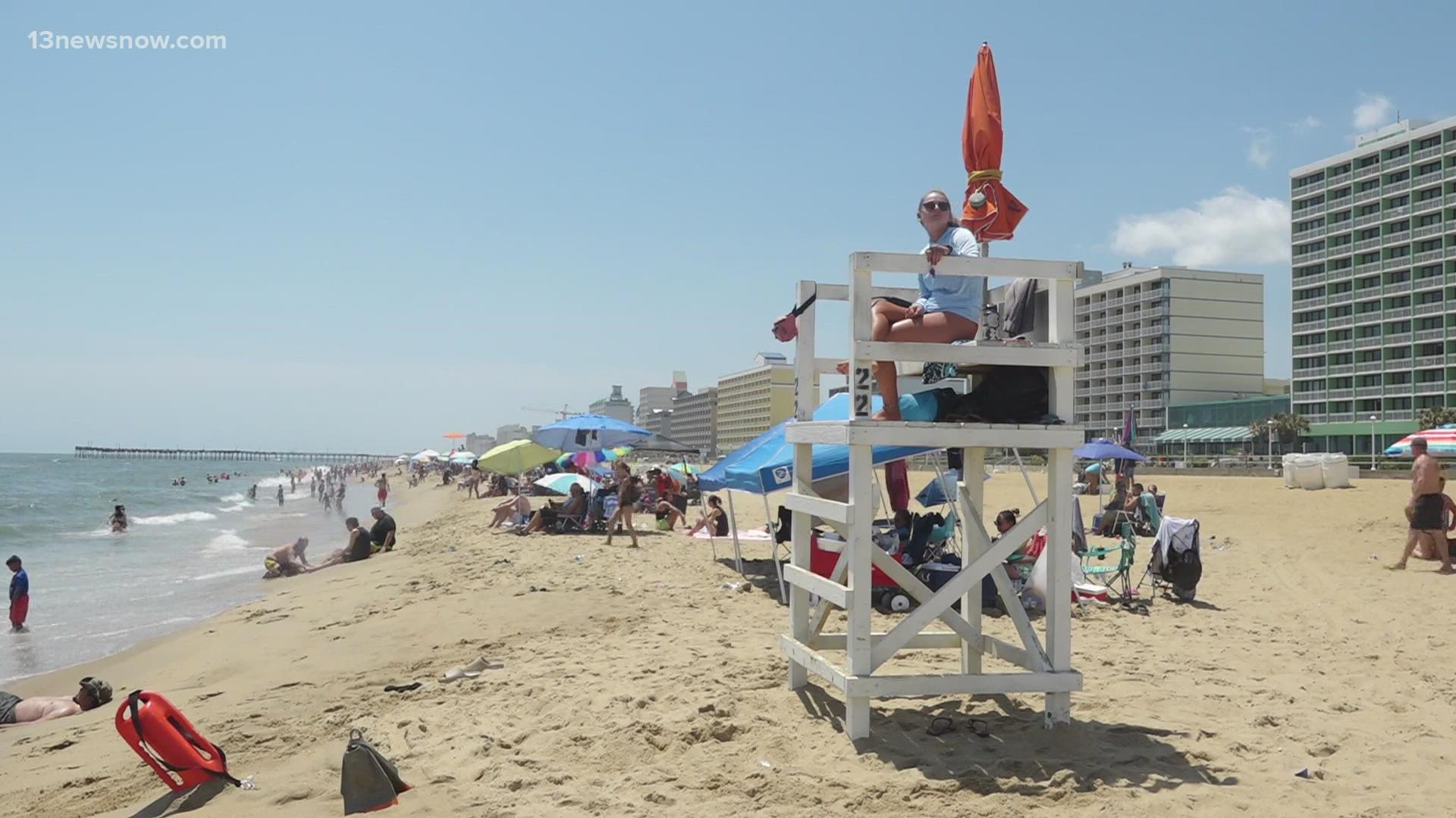 The Virginia Beach Lifeguard Association says its crews rescued dozens of swimmers over the holiday weekend.