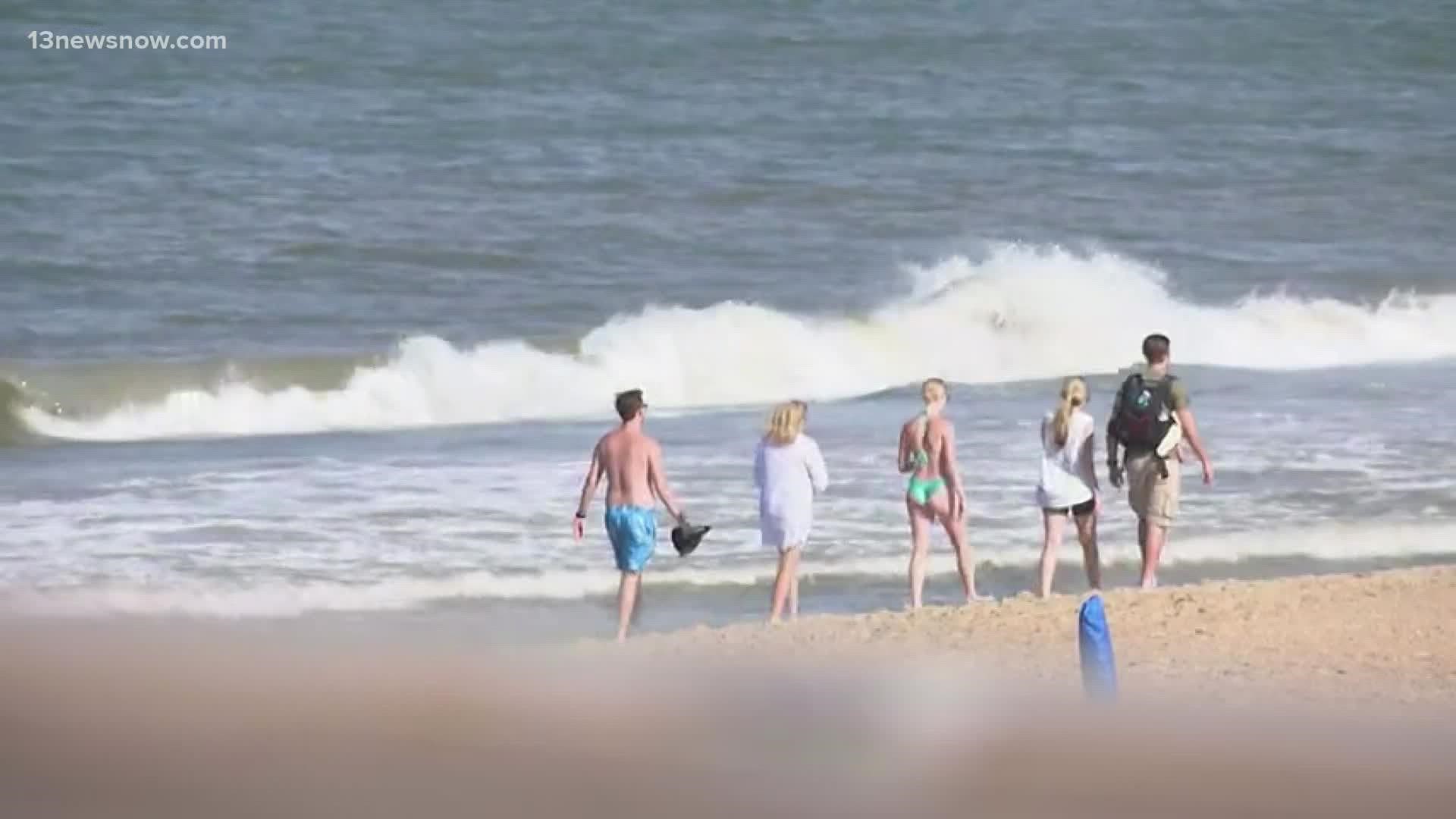 While the tropical storm warning was in effect Saturday, plenty of vacationers still enjoyed the beaches along the Outer Banks.