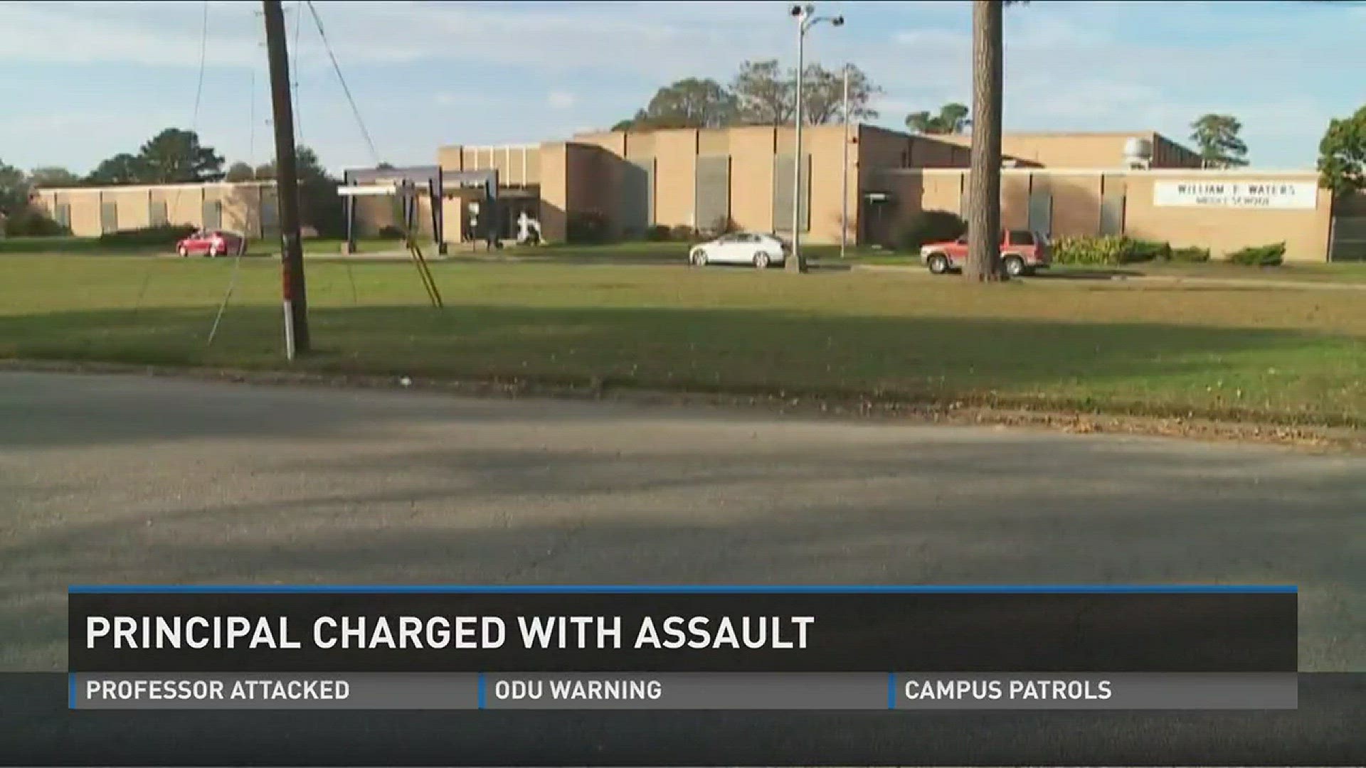 The middle school principal is charged with assaulting a student.