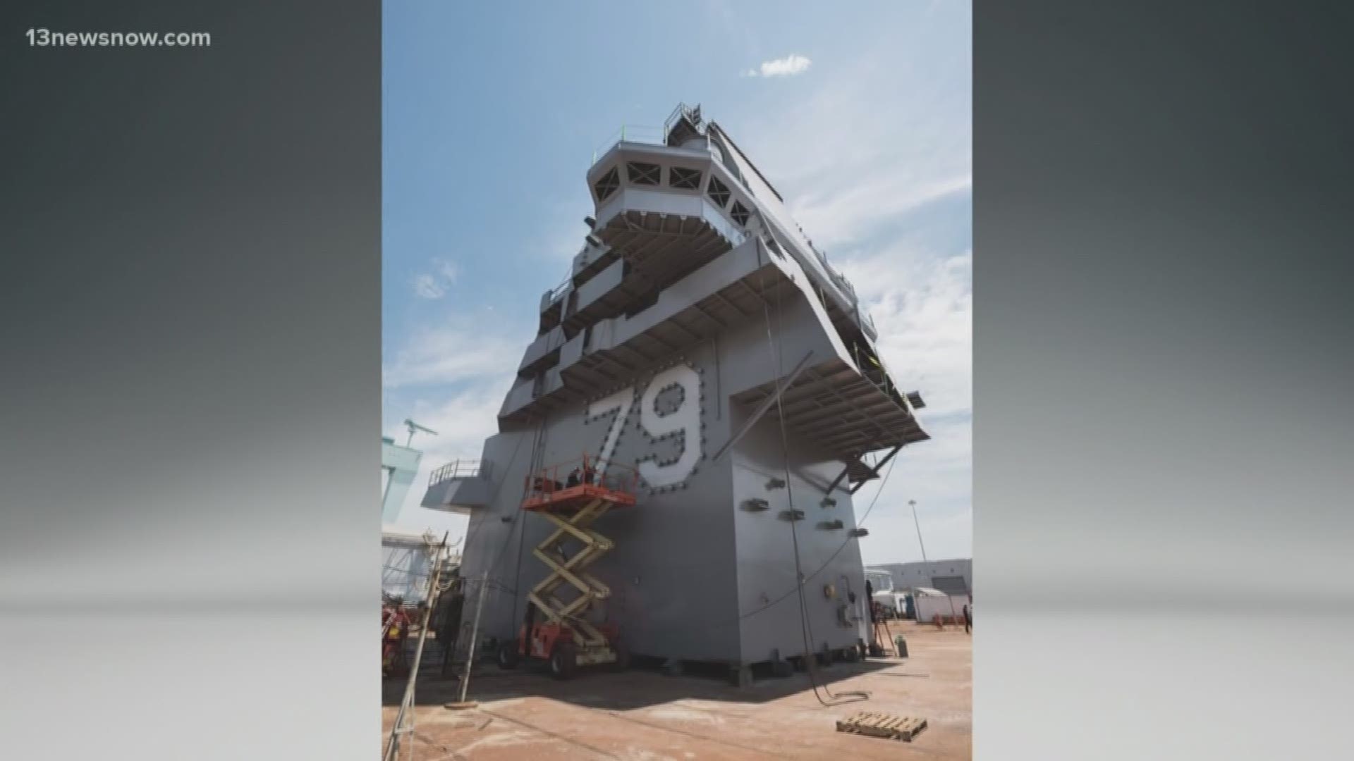 The 555-metric ton island bearing the number "79" will be raised and lowered into place on board the future USS John F. Kennedy's flight deck. The ceremony at Newport News Shipbuilding will mark the final super lift in the construction process of the 100,000-ton warship