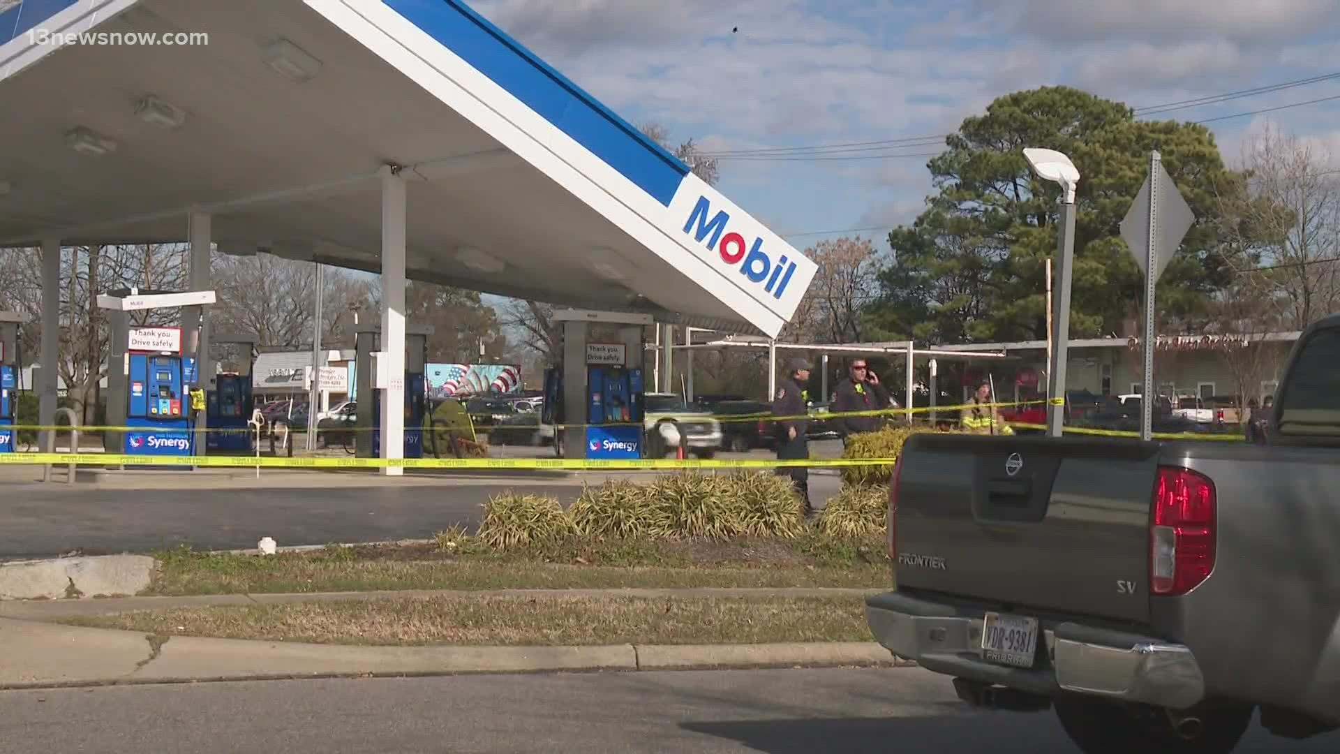 In Virginia Beach along South Rosemont Road, people stopped to take pictures of a teetering rooftop of the Mobil gas station.