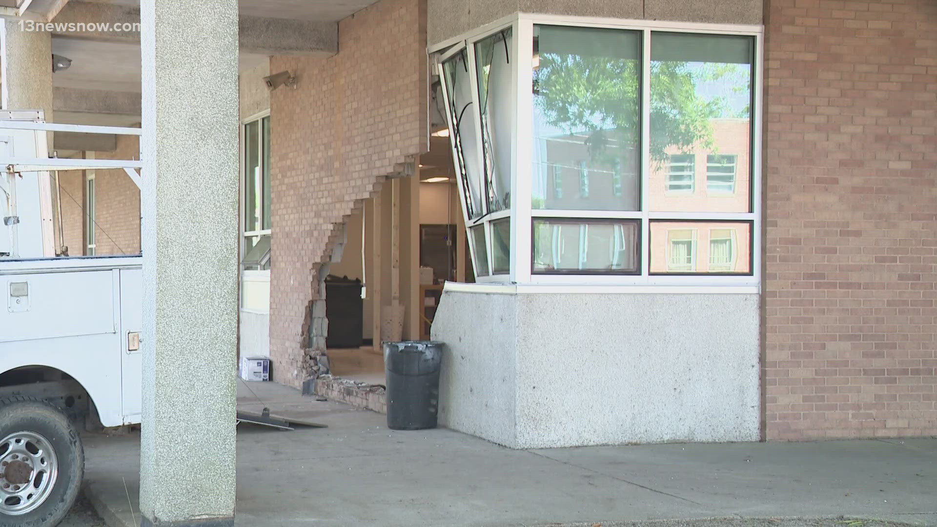 One person was hurt when a vehicle crashed into Booker T. Washington High School in the early morning hours.