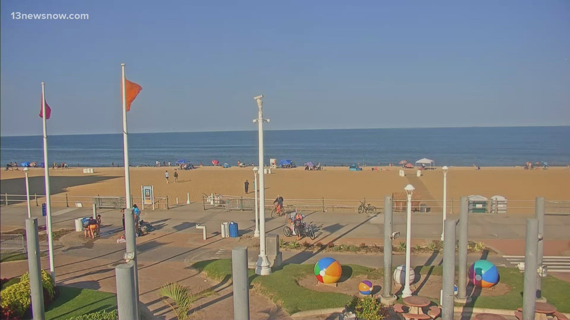 Dozens of lifeguards lined the Virginia Beach Oceanfront on Friday. They kept watch while taking safety precautions of their own.