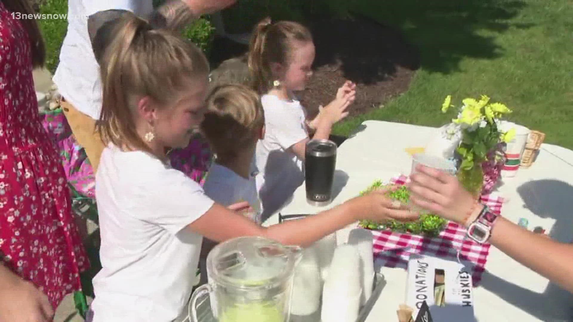 The Smith siblings decided to open up a lemonade stand and sell treats to help the dogs.