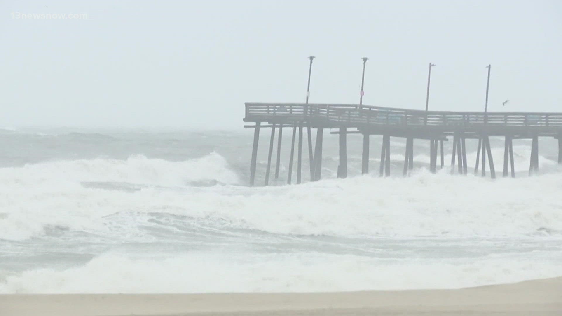 There wasn't a person in sight on the boardwalk at the Virginia Beach Oceanfront as high winds and rain fell Friday morning.
