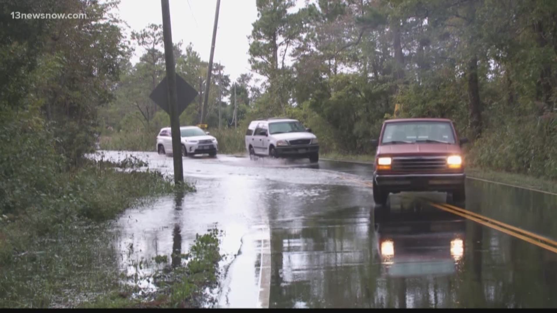 Another strong southwest wind is flooding another road in Pungo.