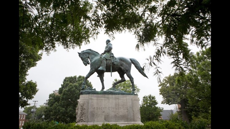 Man charged again with removing tarps on Confederate statues ...