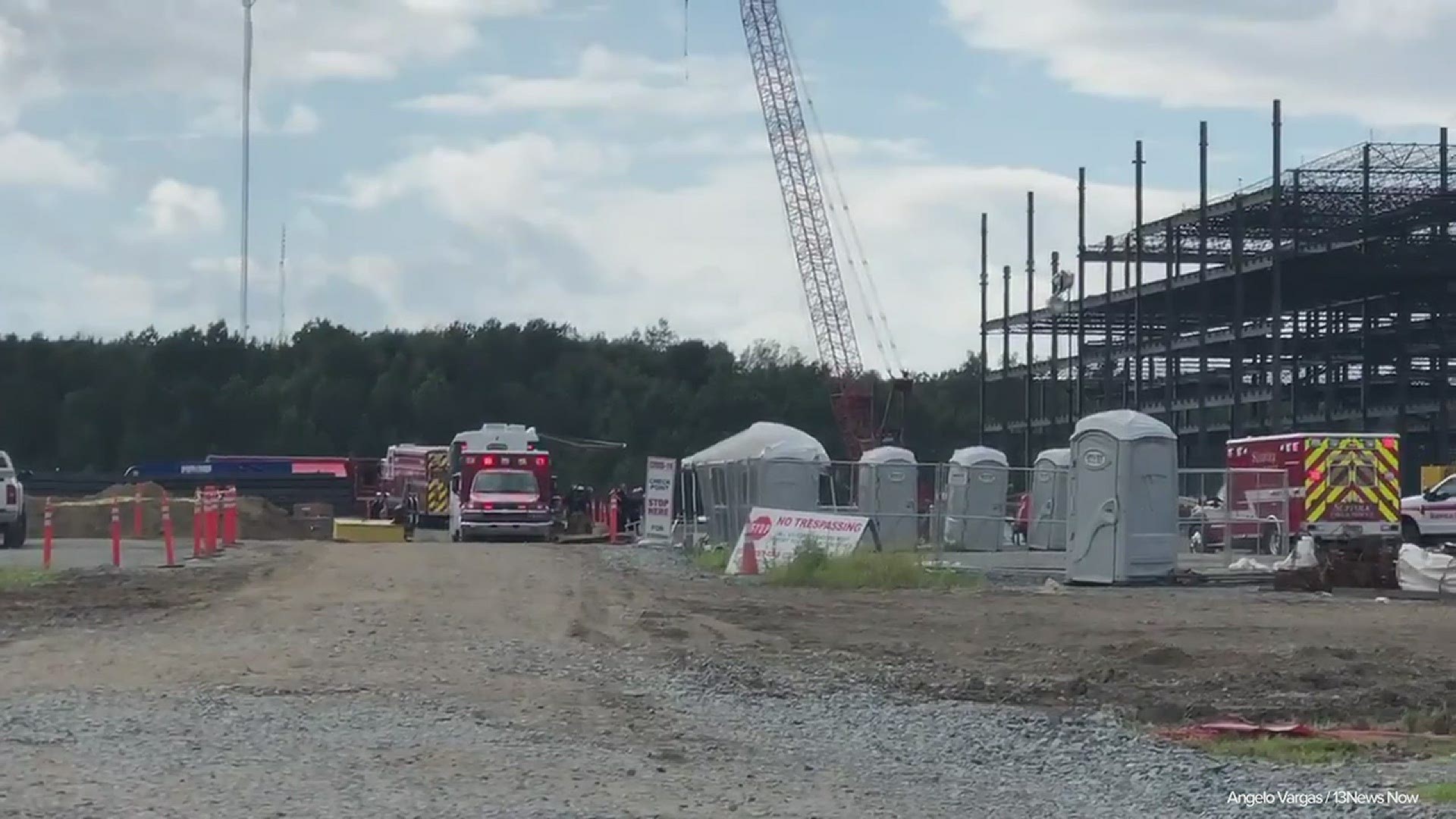 Suffolk Fire & Rescue crews are searching for other workers who may have survived the accident. The Amazon robotics fulfillment center was under construction.