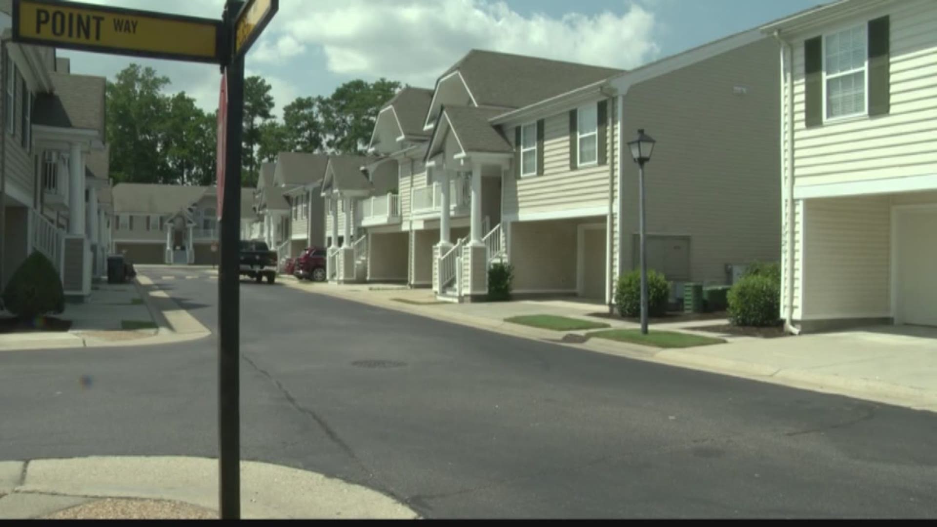 Police were in Towne Square condominiums in Windsor Oaks where officers found two people dead inside a home on Wednesday.