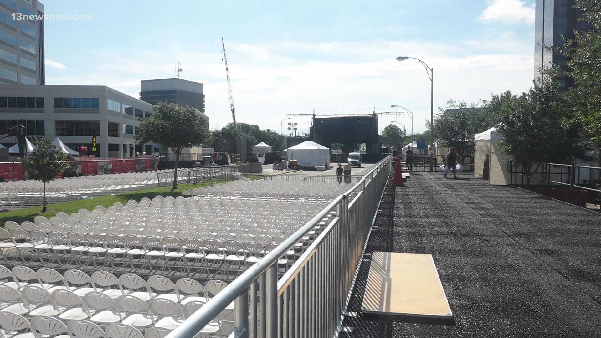 Crews shut down the waterfront roadway to make way for a massive stage right in the middle, with I-264 as a backdrop.