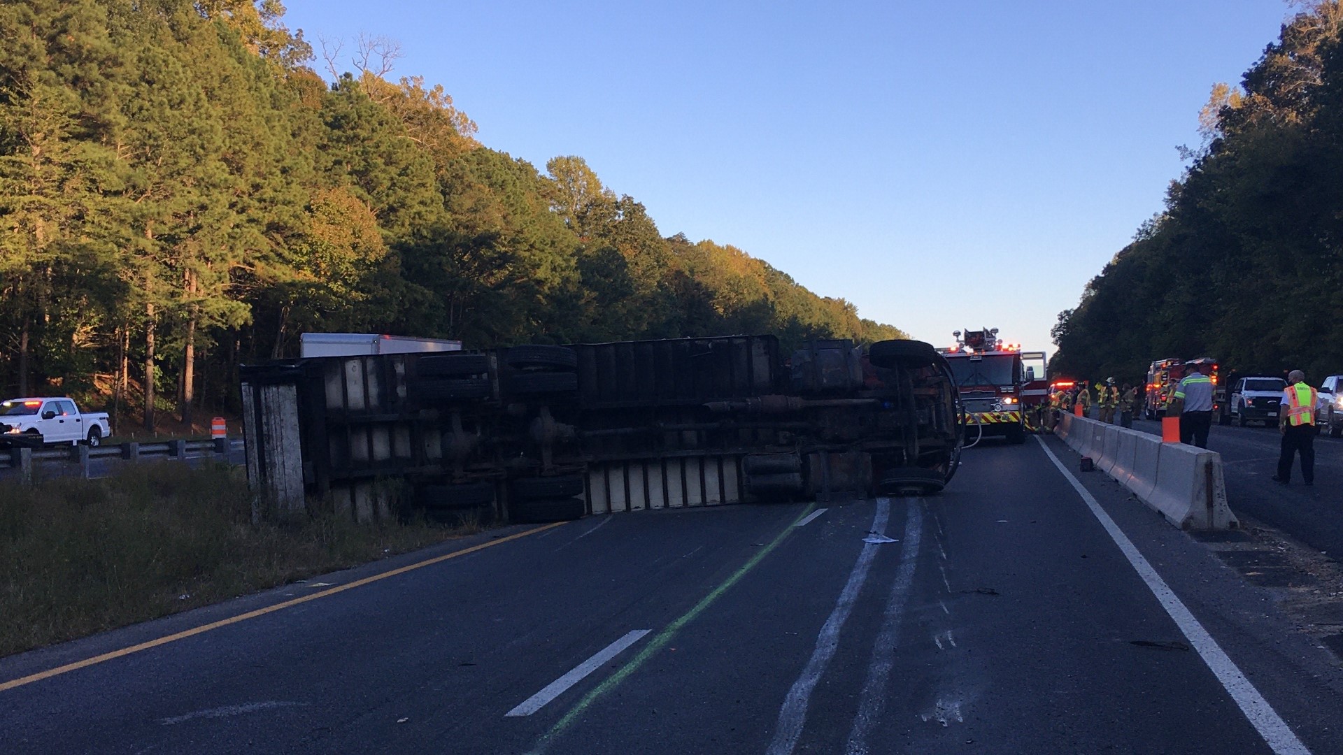Driver hurt after tractor-trailer overturns on I-64 in James City ...