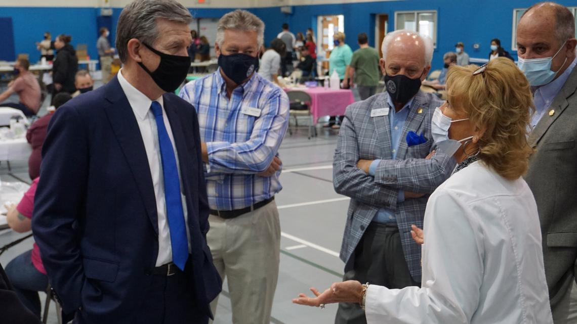 Gov. Roy Cooper tours Dare County vaccination site, urges people to get vaccinated ahead of tourist season - Vimarsana News