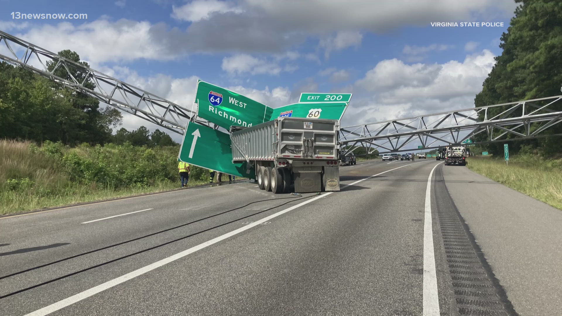 All the westbound lanes of I-64 near New Kent and the Henrico County line were closed for hours after the raised bed of a tractor-trailer hit an overhead sign.