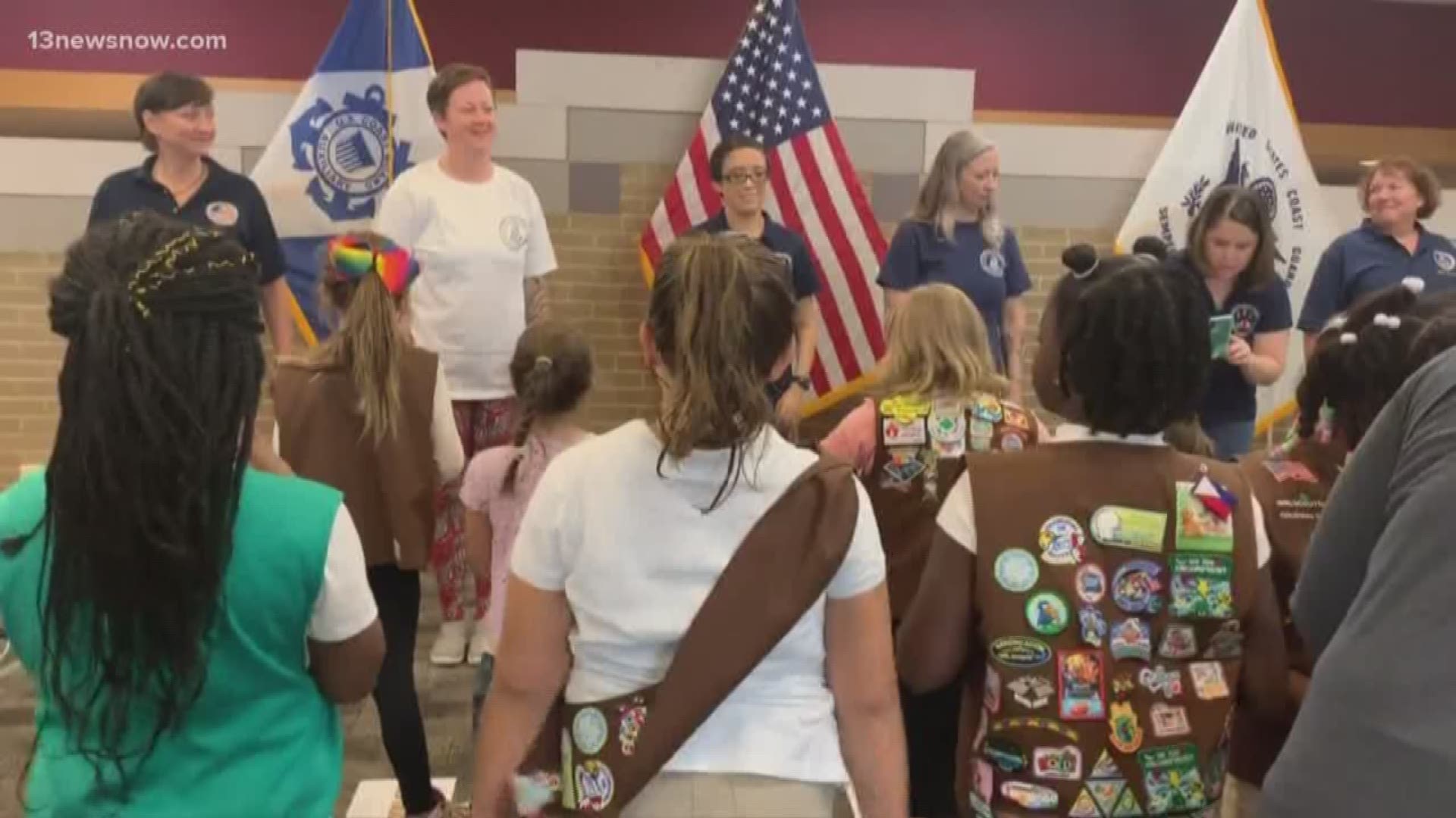 Girl Scouts visited the Coast Guard base in Portsmouth and participated in hands on activities. They learned to properly fold a flag, hot to tie knots, and more.