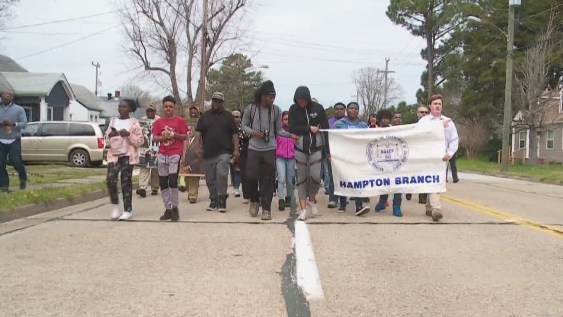 People in Hampton marched across the Martin Luther King Memorial Bridge on to Fort Monroe.